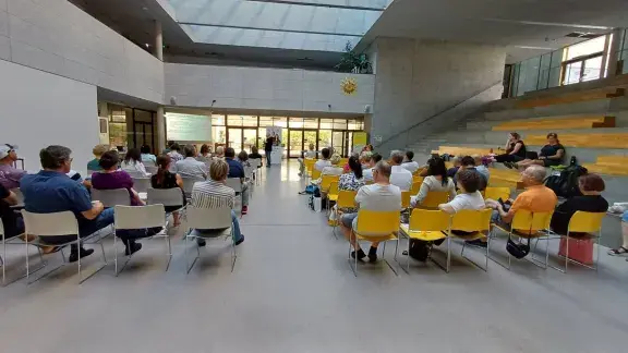 Polyaktiv Sommerakademie 2025 - Vortrag von Martin Kandlhofer, Publikum von hinten fotografier